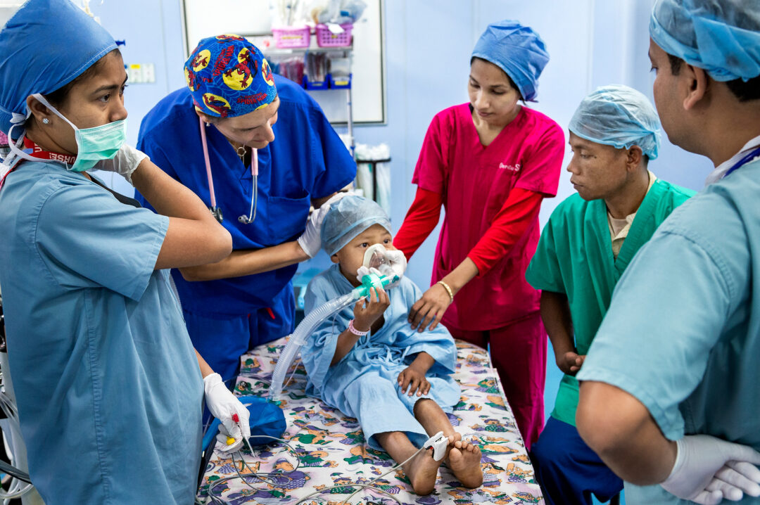 Cleft patient in theatre with medical staff
