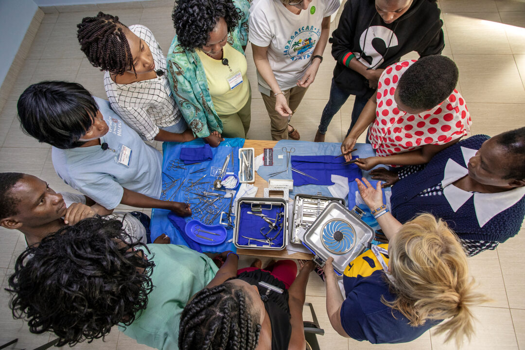 Operation Smile volunteers exchanging experiences during surgical programme in Malawi.  Photo: Zute Lightfoot