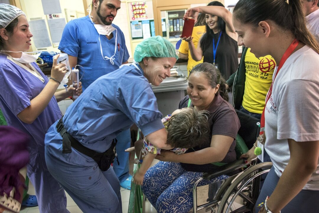 Nora and Damian are reunited after his cleft lip surgery. This was the moment when Nora knew his life had been forever changed for the better. Photo: Margherita Mirabella.