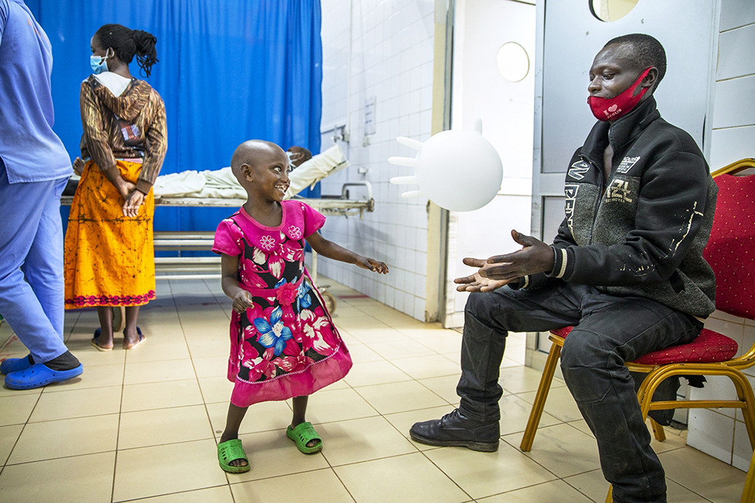 Valentine smiles playfully at dad Jean. Photo by Jorgen Hildebrandt.