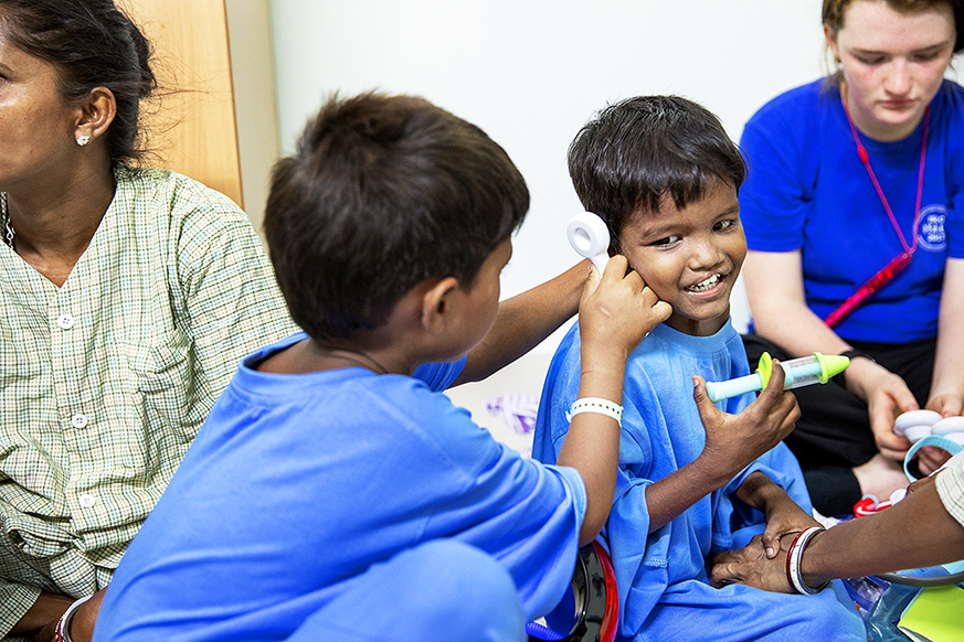 Bipul and Monu play together as they wait to receive their cleft lip surgeries. Photo: Jasmin Shah.