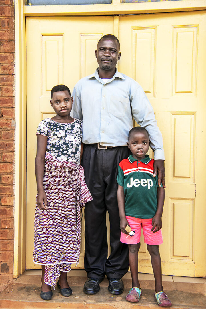 Vailet and Izeki with their uncle, Rabson. Photo: Margherita Mirabella.