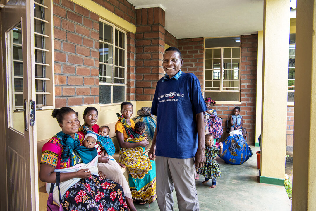 Community volunteer Alick interacting with patients waiting for surgery. Photo: Margherita Mirabella