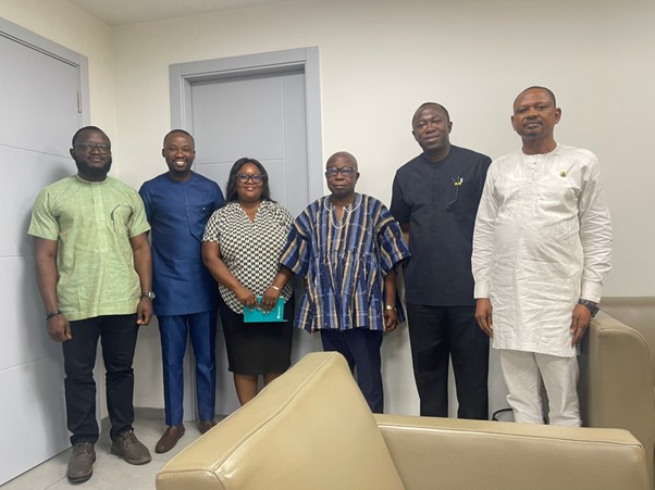 Ghana Minister of Health, Hon. Kwaku Agyeman Manu, standing with members of the Operation Smile Ghana team.