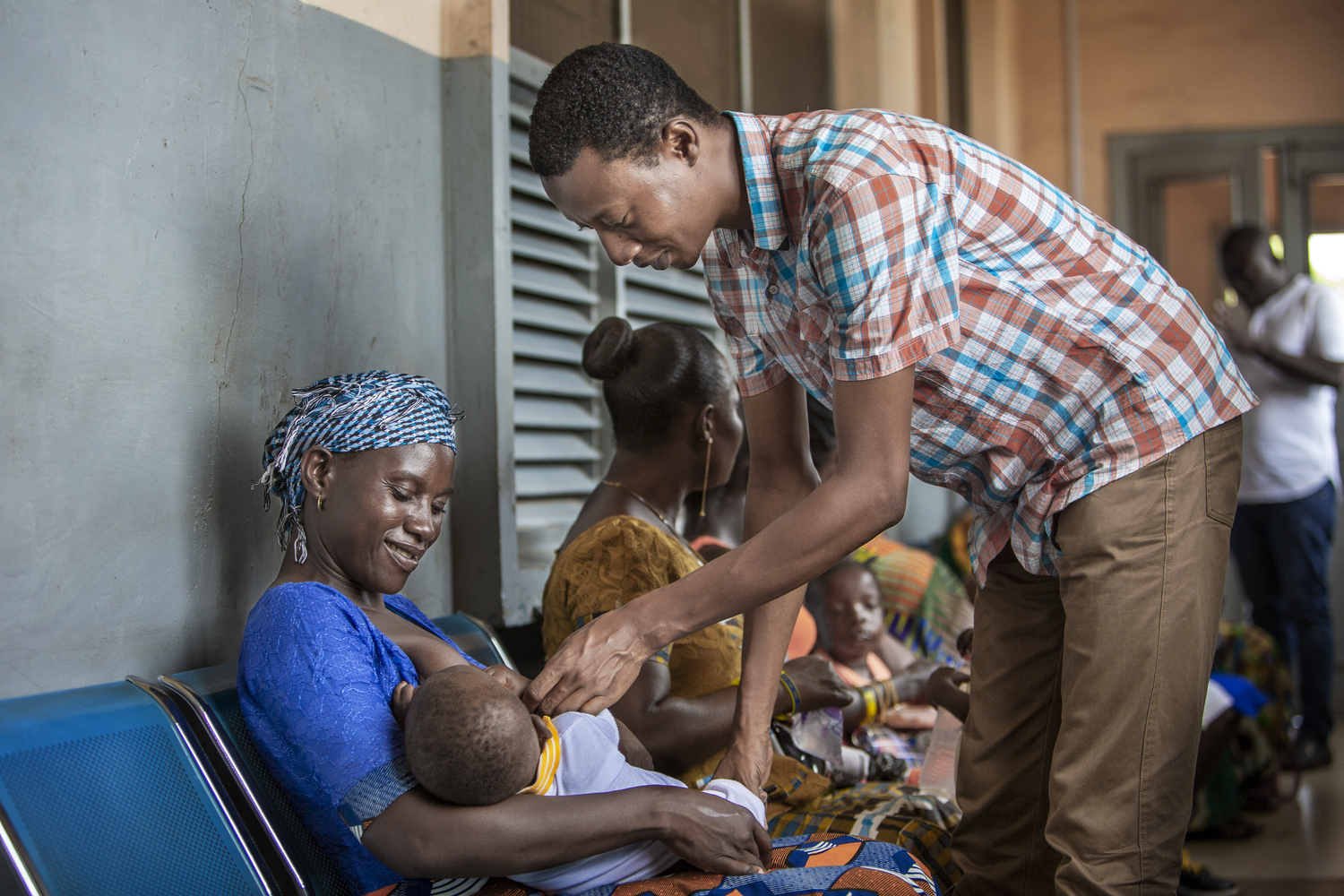 Dr Elliot Arko Boham with a patient.