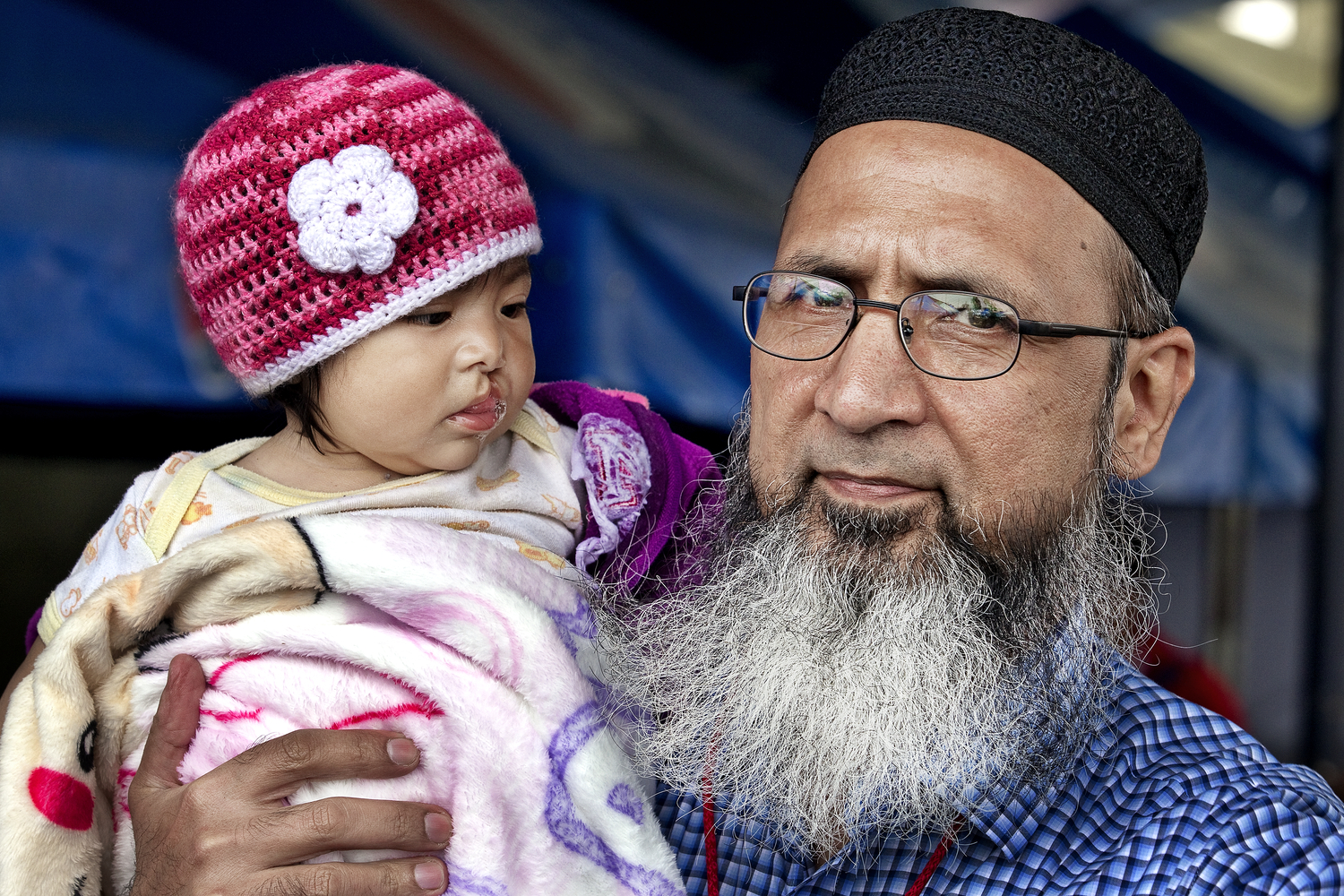 Plastic Surgeon Dr Ghulam Qadir Fayyaz with a patient in Puebla, Mexico Photo: Marc Asher
